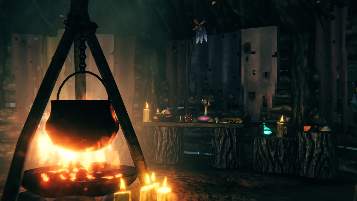Valheim swamp hut interior with a cauldron and candles